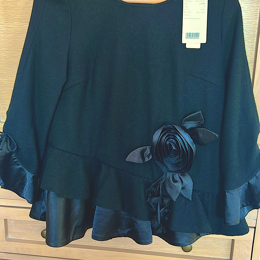 Beautiful fun sweater in wool blend and satin.